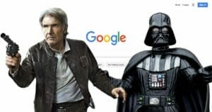 A darth vader and a star wars character in front of a google search.