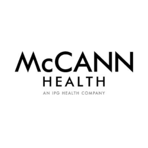 Mccann health logo on a white background.
